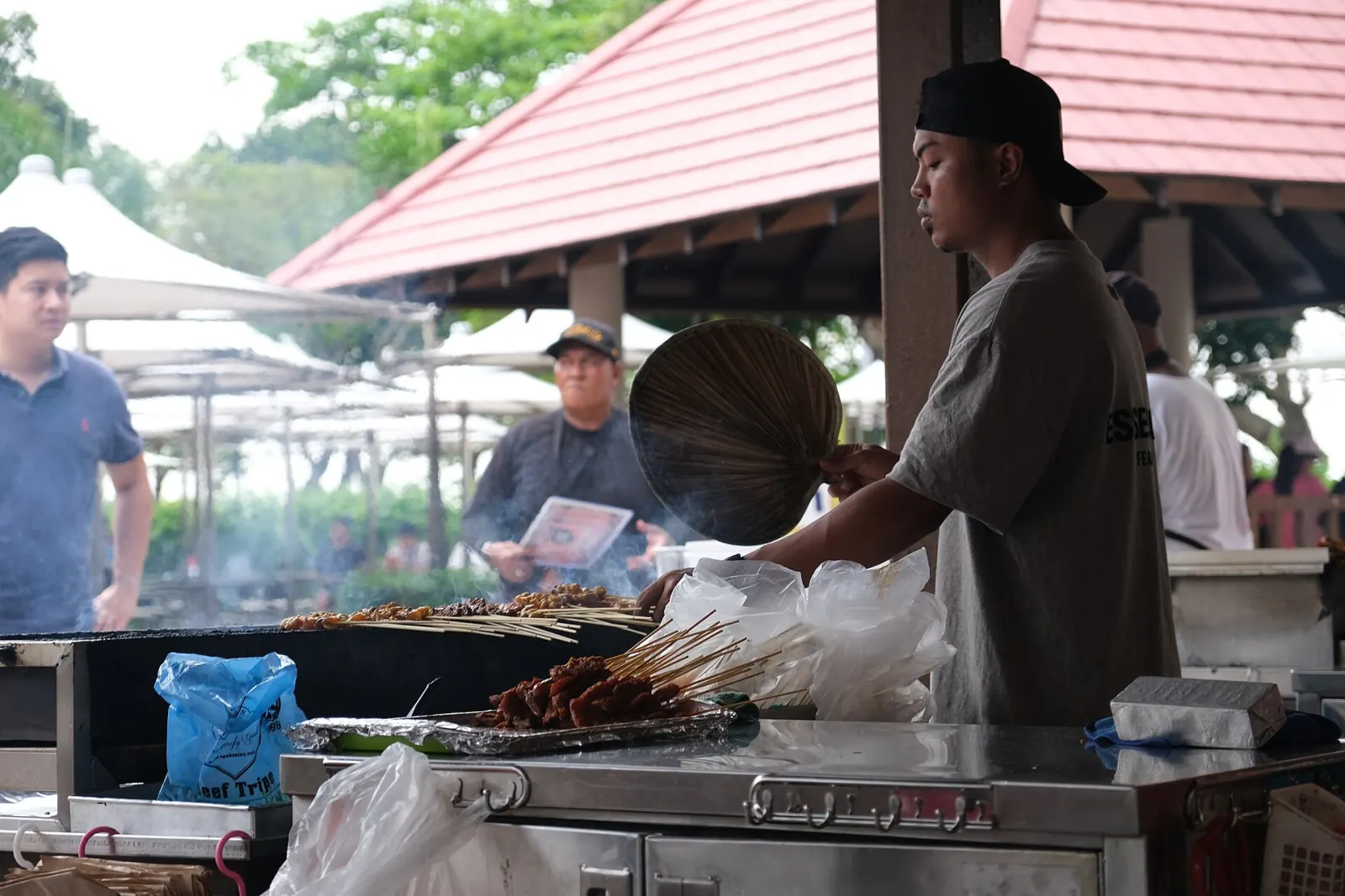 A satay stall grilling skewers at East Coast Lagoon Food Village.