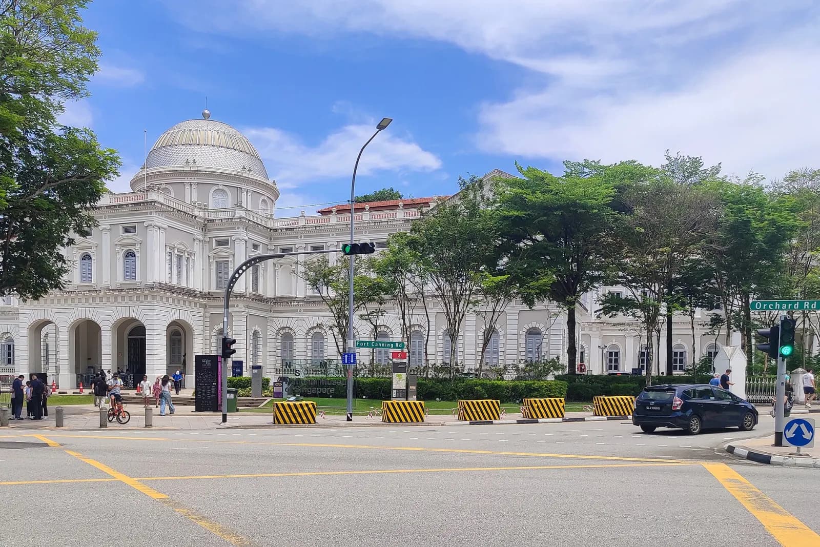 White facade and dome of the National Museum of Singapore on Stamford Road.