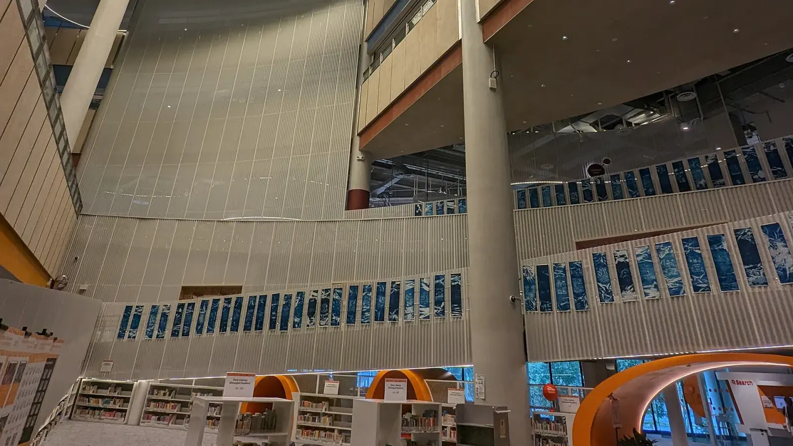 Multilevel interior of Punggol Regional Library viewed from the ground level.