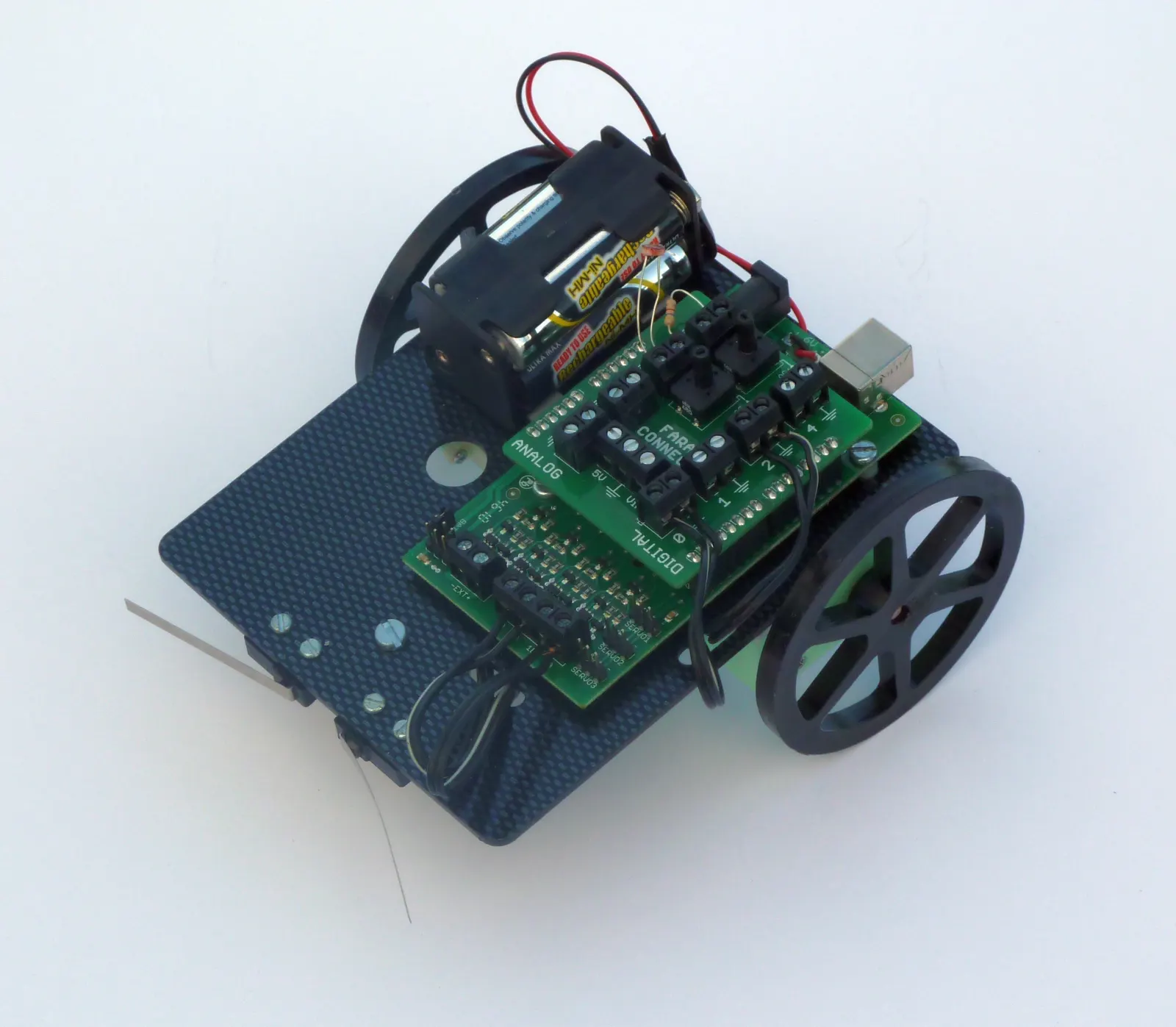 An assembled small wheeled Faraduino educational robot kit.