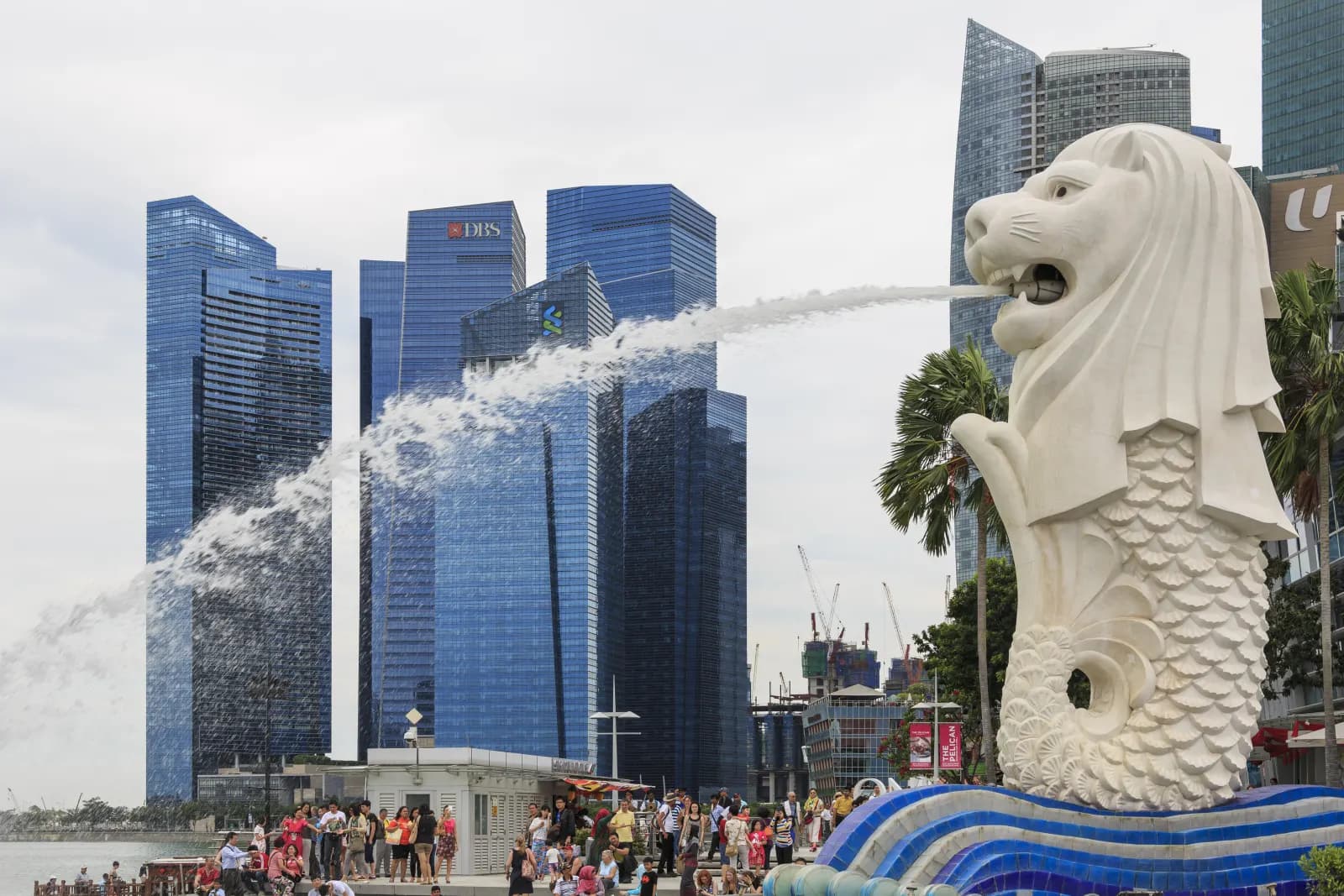 The Merlion statue spraying water into Marina Bay.