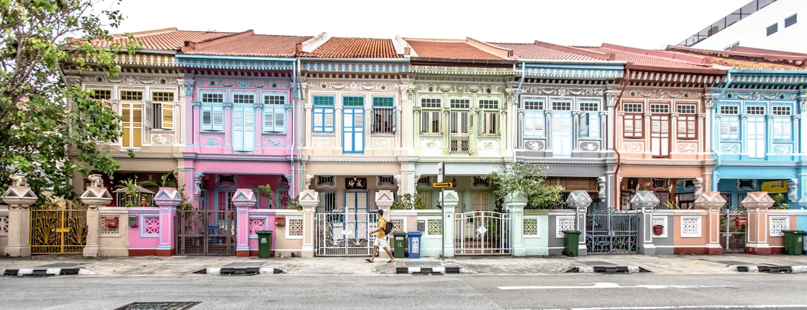 A row of colourful conserved shophouses in Joo Chiat, Singapore.