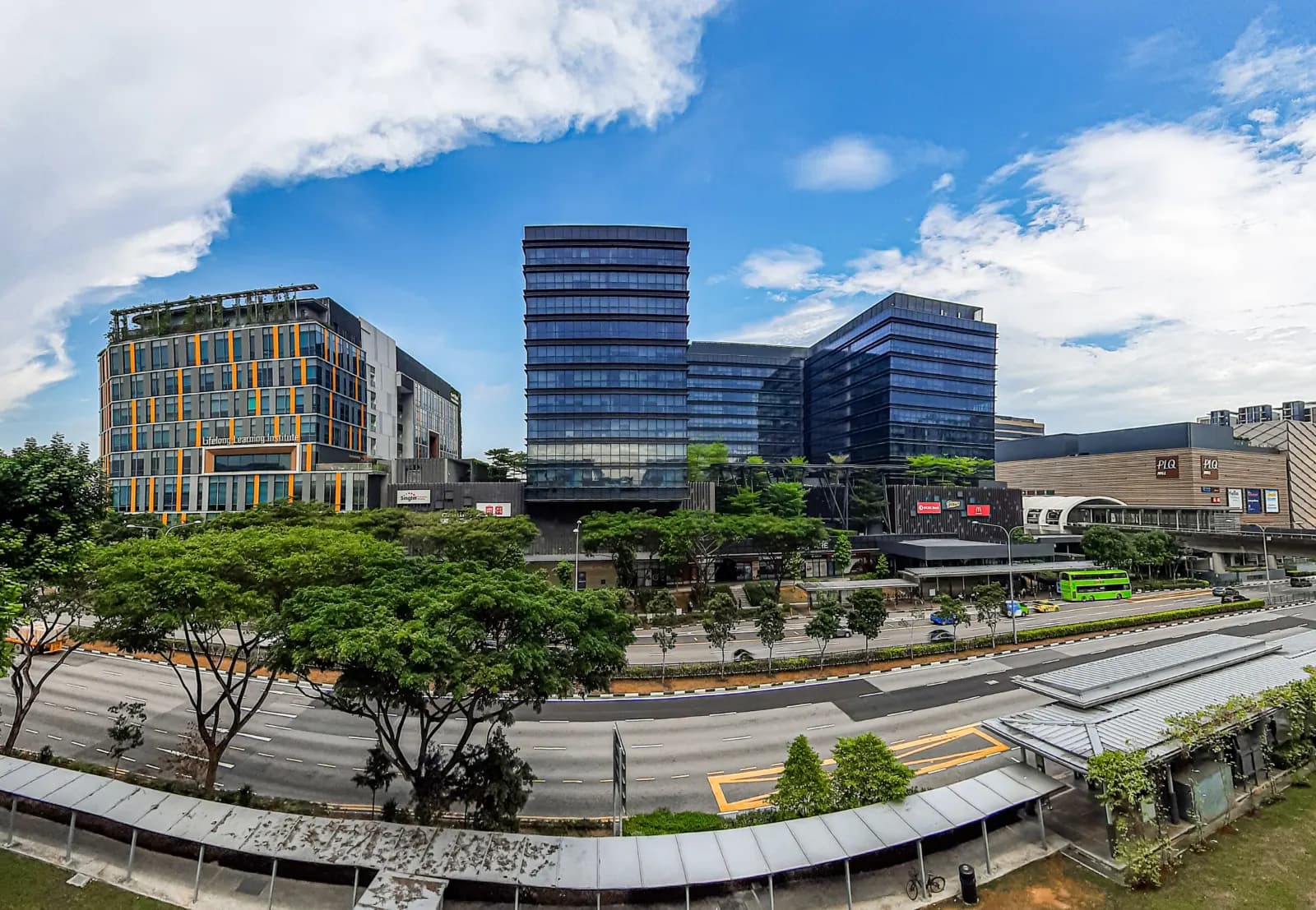 Paya Lebar streetscape with Singapore's Lifelong Learning Institute in the background.